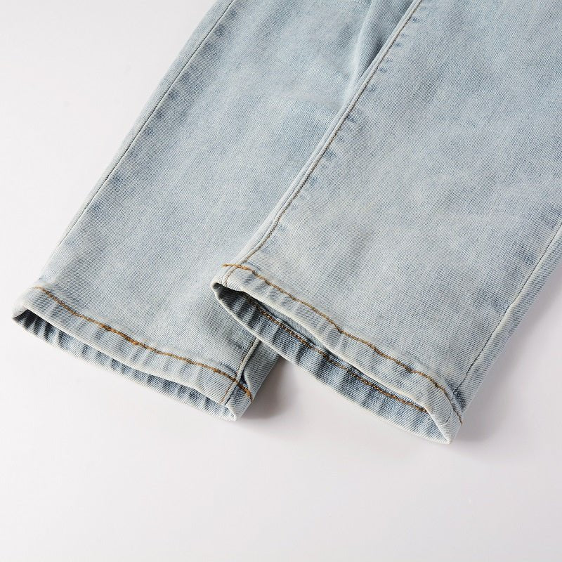 Amiri Hellblaue Patchwork Jeans für Herren – Distressed Luxus Slim Fit Denim