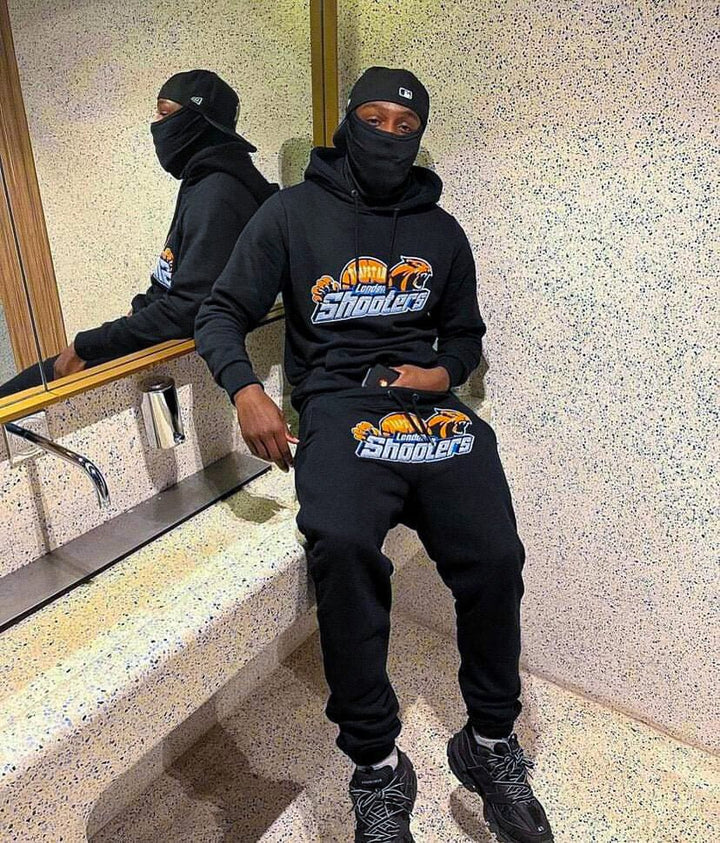 Stylischer Trapstar London Shooters Trainingsanzug Schwarz Orange – Komfort & Streetwear