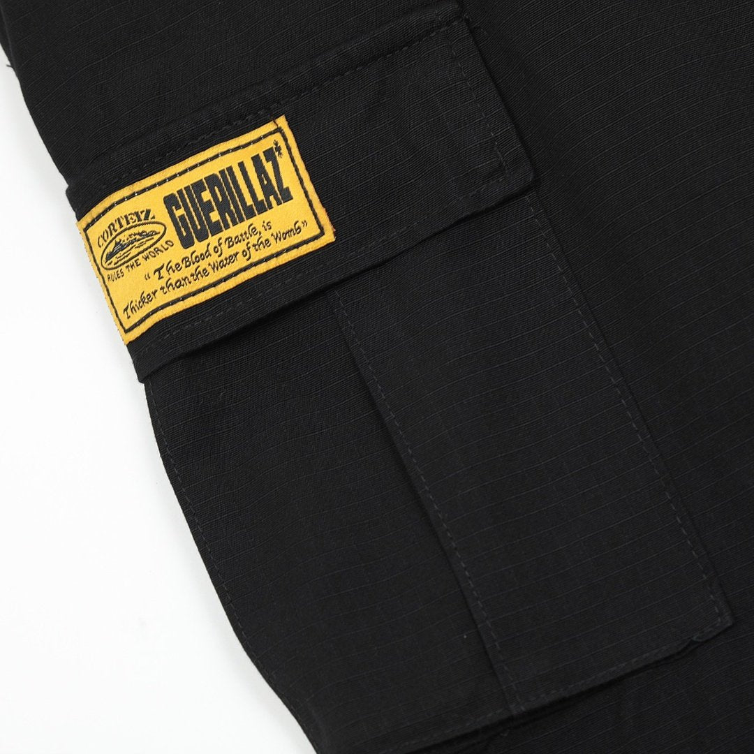 Corteiz Cargo Shorts Schwarz Gelb – Robuste Streetwear für den urbanen Look