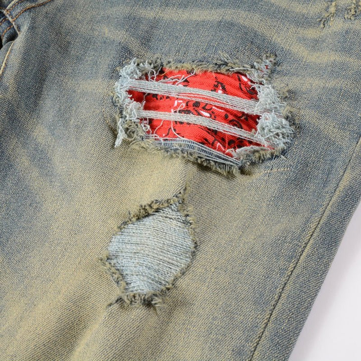 Amiri Patch-Effekt Blue Jeans: Luxuriöse Designer Denim mit Rock'n'Roll Flair