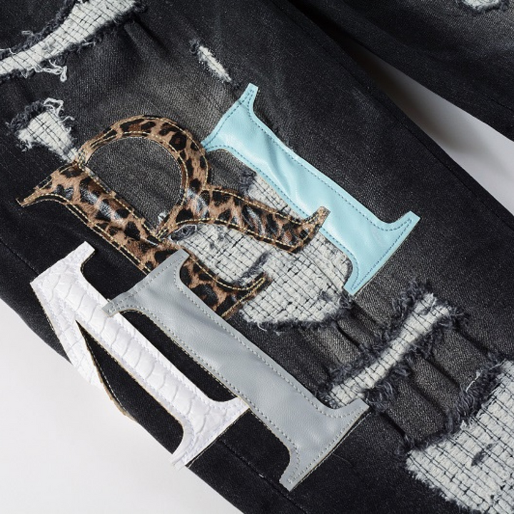Amiri Logo Distressed Schwarze Jeans – Stylische Designer Denim für Herren