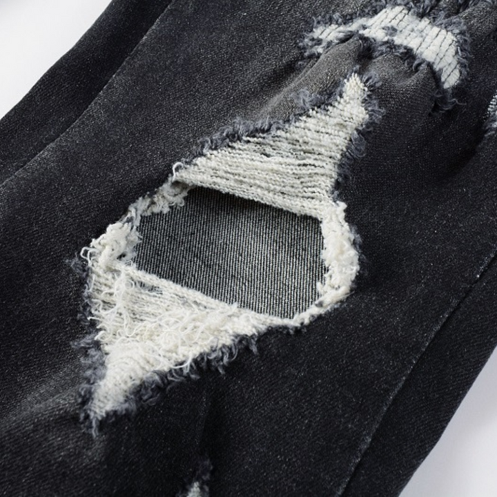 Amiri Logo Distressed Schwarze Jeans – Stylische Designer Denim für Herren