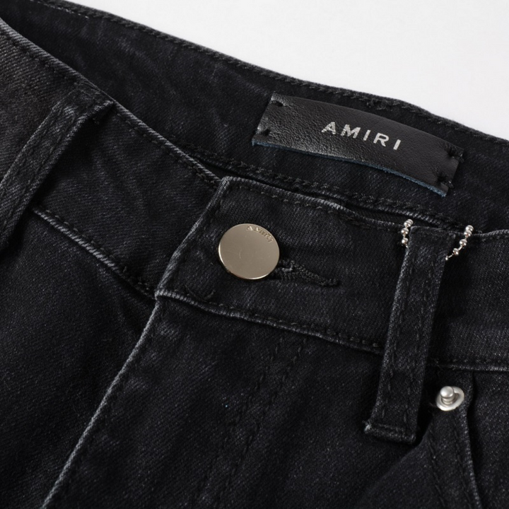 Amiri Luxus Denim Jeans: Auffällige Patches, Risse, Slim Fit Designer Stil