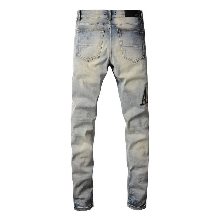 Amiri Camo Logo Jeans: Stylische Designer Stretch Denim Hose mit Tarnmuster