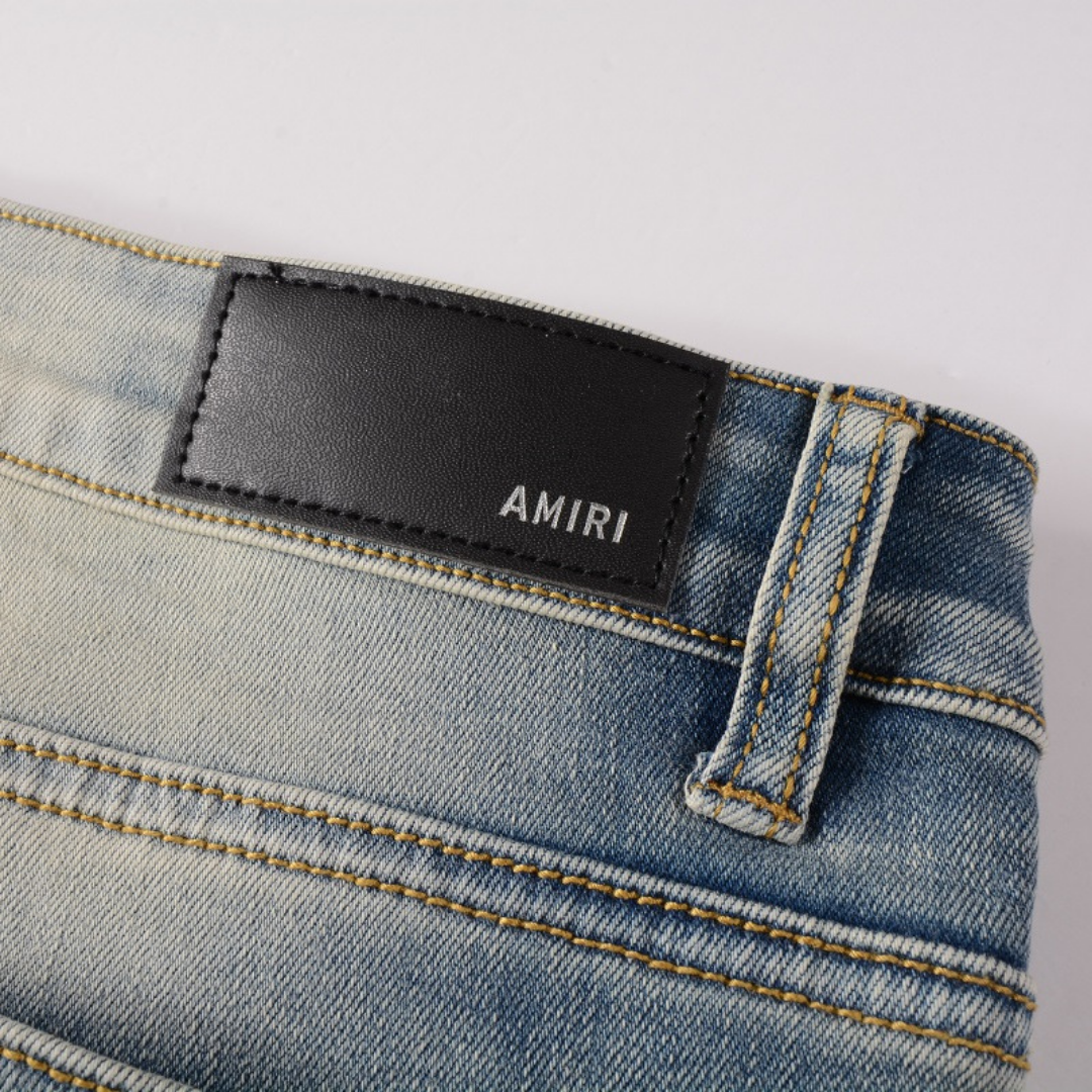 Amiri Camo Logo Jeans: Stylische Designer Stretch Denim Hose mit Tarnmuster