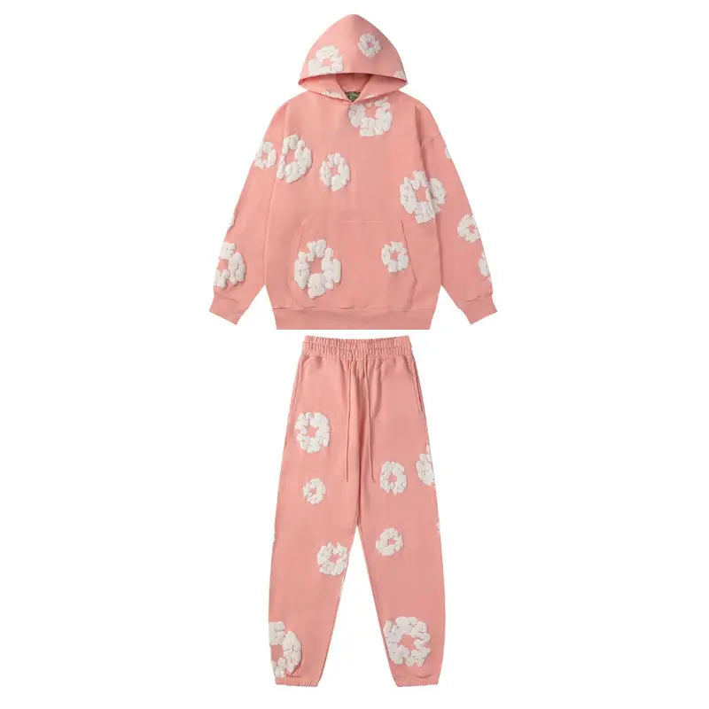 Denim Tears Rosa Baumwoll-Trainingsanzug: Stilvoller Freizeit-Look für Damen und Herren