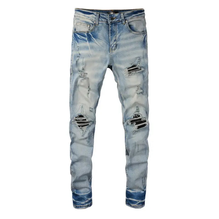 Amiri Herren Luxus Schwarze Patch Jeans – Designer Denim mit Destroyed Look