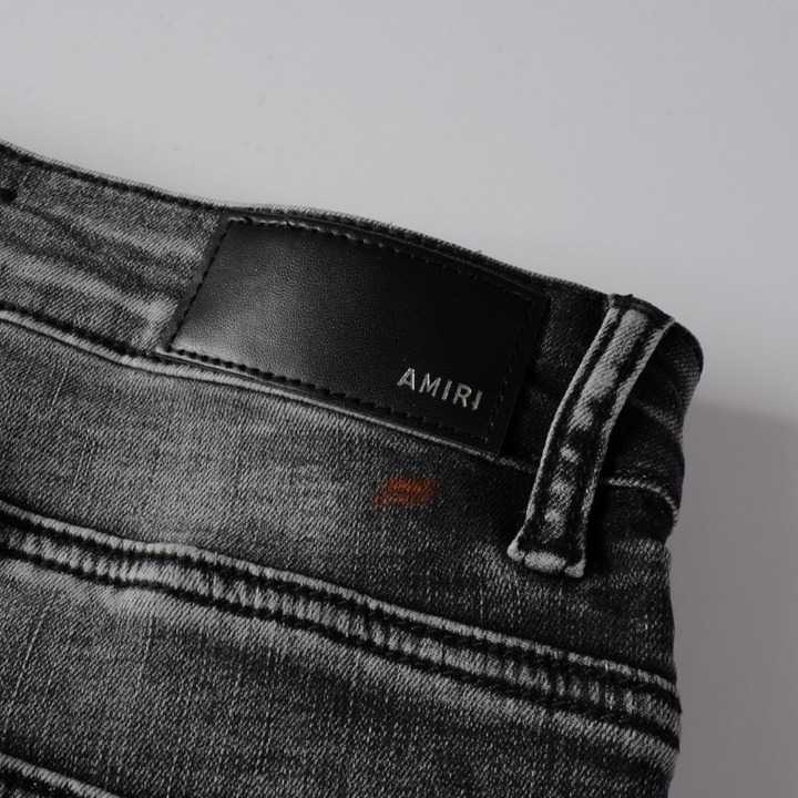 Amiri Distressed Paint Jeans Herren – Luxus Designer Denim mit Kunstvollen Farbspritzern