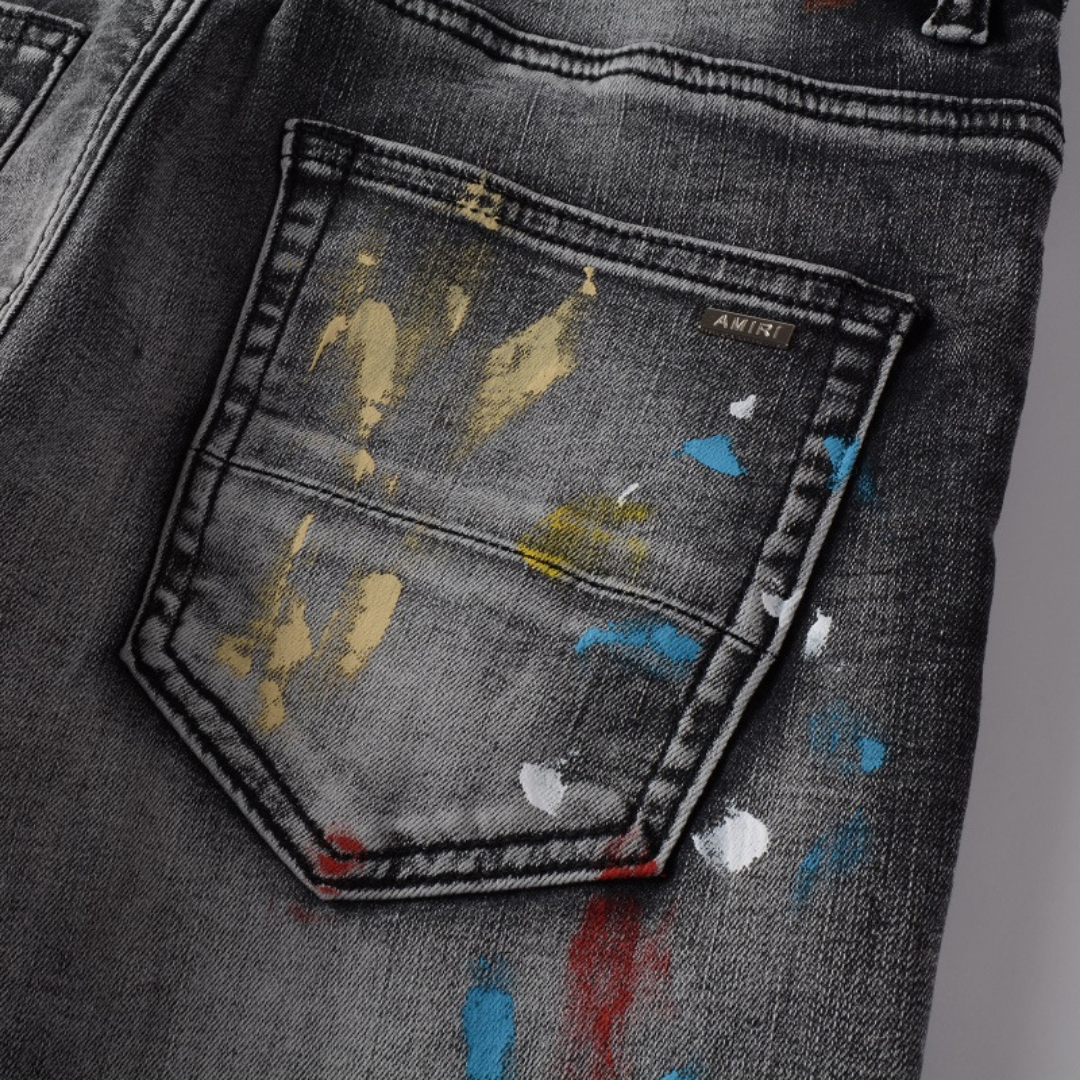 Amiri Distressed Paint Jeans Herren – Luxus Designer Denim mit Kunstvollen Farbspritzern