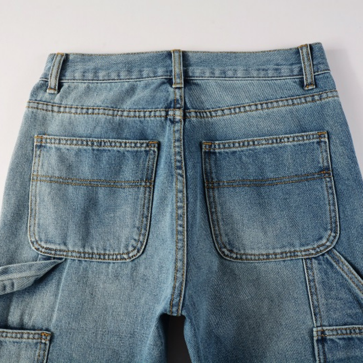 Amiri Blaue Patch Flared Jeans: Luxuriöse Denim-Hose mit Schlag für Herren