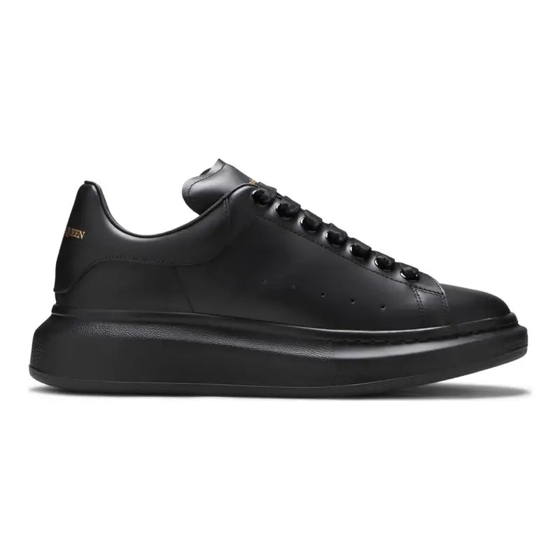 Alexander McQueen Schwarzer Leder Sneaker: Luxus, Komfort & Ikonischer Stil