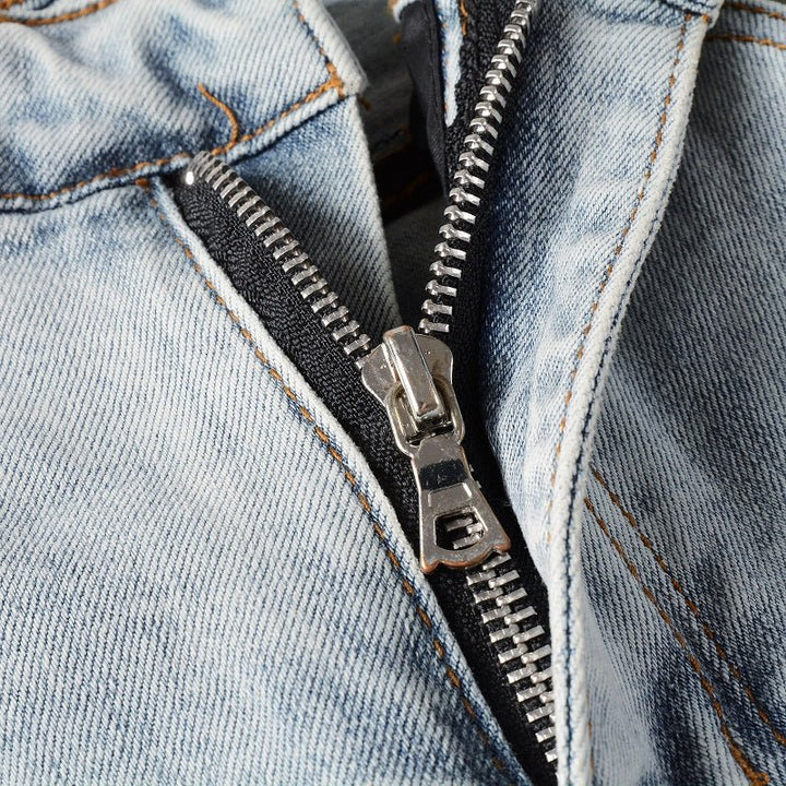 Amiri Hellblaue Patchwork Jeans für Herren – Distressed Luxus Slim Fit Denim