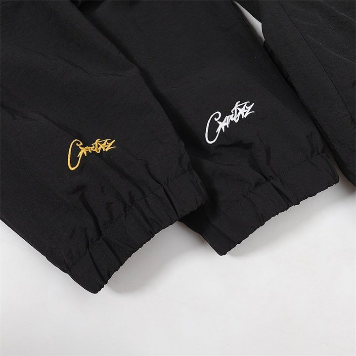 Corteiz Schwarzer Gelber Trainingsanzug Set – Stilvoller Streetwear Freizeitanzug für Herren